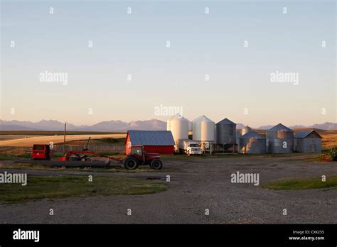 Farm With Barn Tractors And Silos Pincher Creek Alberta Canada