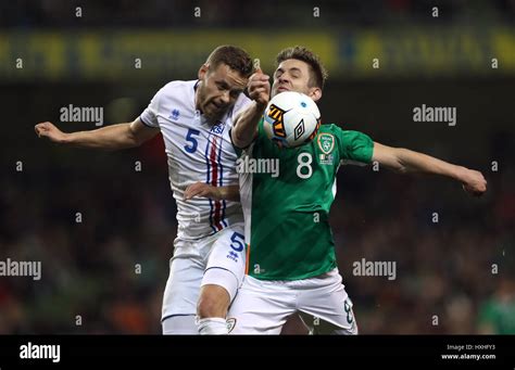 Republic Of Irelands Kevin Doyle Right And Icelands Sverrir Ingason