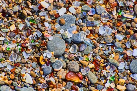 Premium Photo Beach Pebbles Of Smooth Colorful Rocks Covering Coast