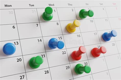 Monthly Calendar Pinned With Push Pins Of Different Colors Stock