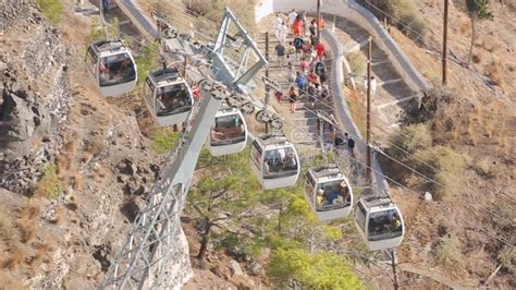 Famous Santorini Cable Cars Transporting Tourists Between Fira And Old