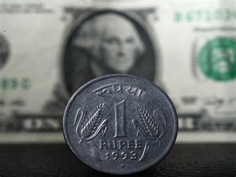 Rupee Falls Paise To Settle At Against Us Dollar