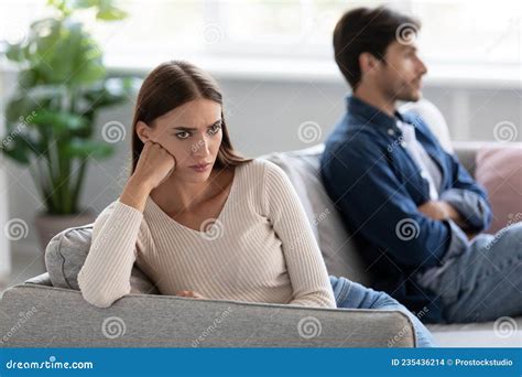 Unhappy Sad European Millennial Husband And Wife Ignore Each Other