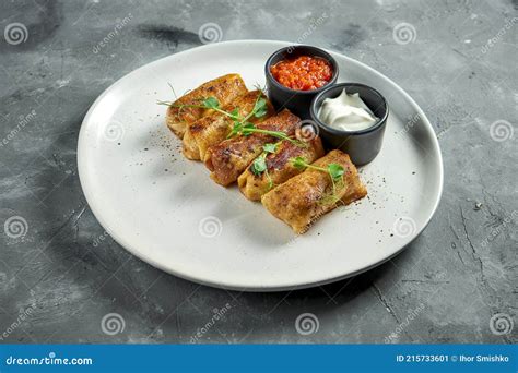 Appetizing Ukrainian Blini With Grounded Meat Filling Served In A