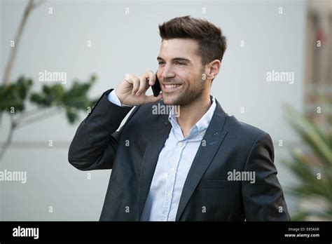 Businessman Using Cell Phone Outdoors Stock Photo Alamy