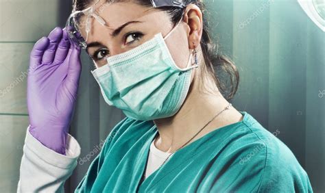 Female Surgeon in Operating Room — Stock Photo © bytefx #8430036