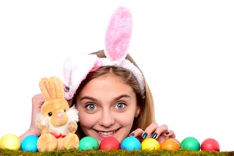 Premium Photo Egg Hunt Girl In Easter Rabbit Bunny Ears With Eggs