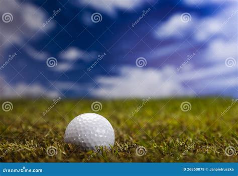 Golf Ball On Green Grass Over A Blue Sky Stock Photo Image Of