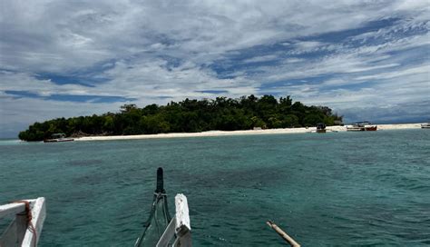 Mantigue Island In Camiguin Snorkeling Blue Waters • The Gees Travel