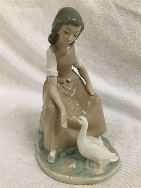 2 Lladro Nao Porcelain Figurines Lladro Nao 1446 Light Of My Days And Girl With Goose