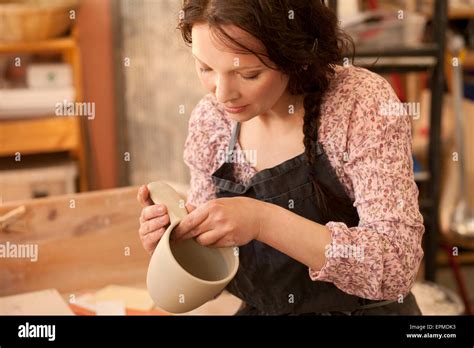 Potter In Workshop Working On Earthenware Pot Stock Photo Alamy