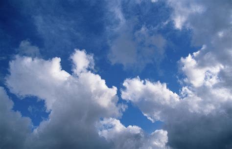 Blue Sky With Fluffy White Cumulus By Andrew Holt