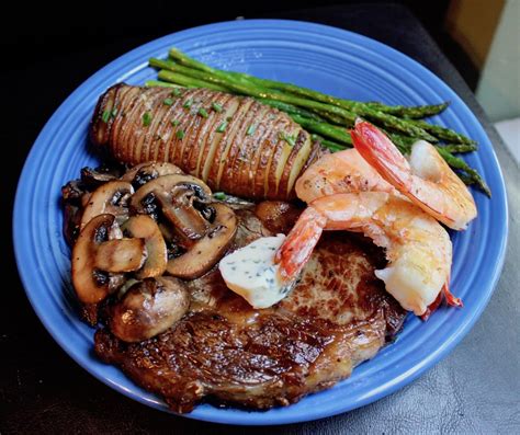 [homemade] Surf And Turf Dinner Ribeye Thyme And Garlic Compound Butter Shrimp Crimini