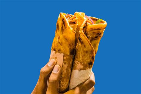 Egg Chicken Rolls In Hand Chicken Egg Rolls Chicken Kathi Roll