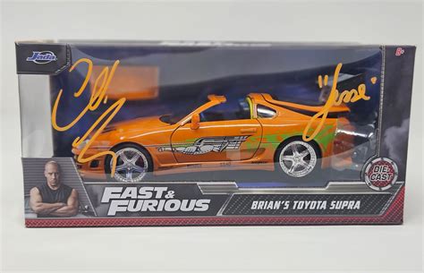 "Fast and Furious" Brian's Orange Supra scale 1/24 -- AUTOGRAPHED ...