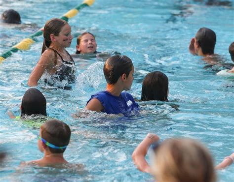 Young Suburban Swim League competitors hit the pool in prelims