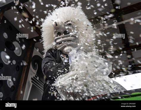 Waggis Costume Inside A Parade Float Throwing Confetti At The Basel