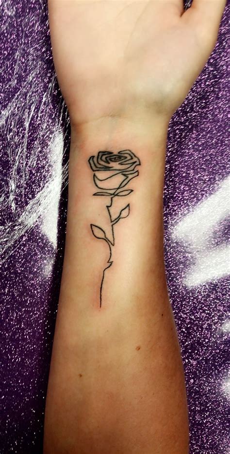 Rose Wrist Tattoo | Rose tattoos on wrist, Tattoos, Tattoos and piercings