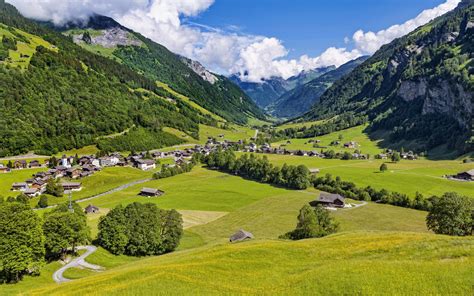 Download Wallpaper 1680x1050 Valley Houses Village Mountains