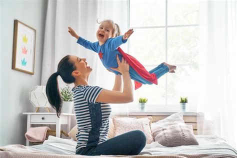 Premium Photo Girl And Mom In Superhero Costume