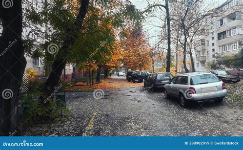 Fall Tree With Orange Leaves In Russian Residential Courtyard With Five