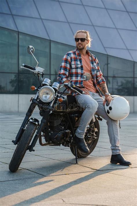 Stylish Motorcyclist With Retro Motorbike In City In Daytime Stock