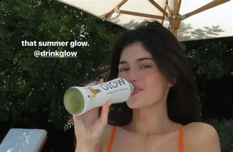 Kylie Jenner Sizzles In Tiny Orange Bikini To Promote New Drink The