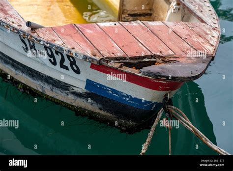 Old Wooden Croatian Fishing Boat With Flag Painted On Bows Old Rotting