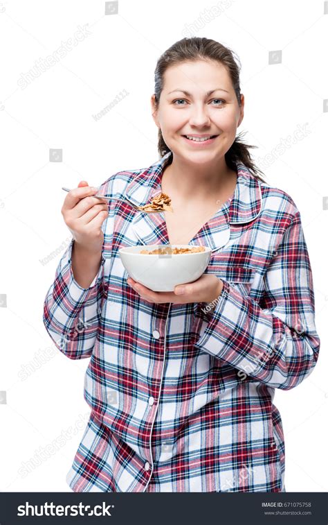 Cheerful Beautiful Brunette Pajamas Eating Breakfast Stock Photo