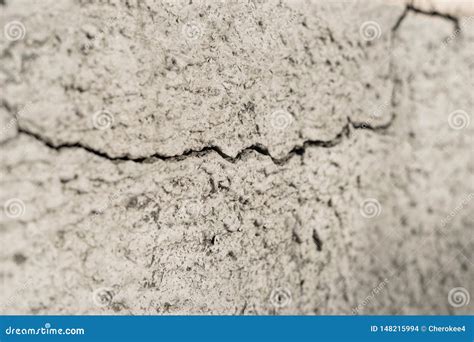 Old Foundation And Plaster Wall With Cracks Building Requiring Repair