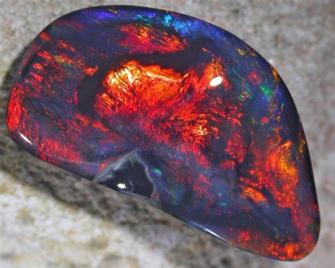 1820 Cts Black Opal Glowing Ember