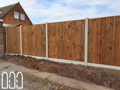 Close Board Fencing With Concrete Posts And Gravel Boards