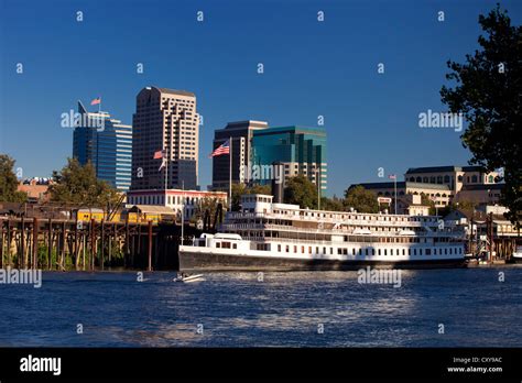 The Downtown Sacramento City Skyline On The Sacramento River Including
