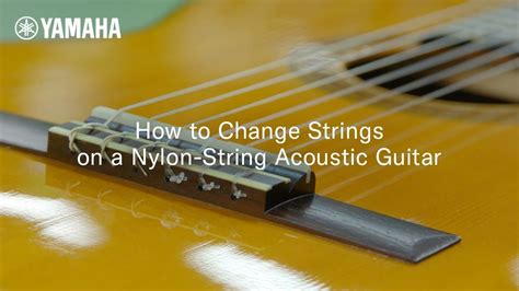 How To Change Strings On A Nylon String Acoustic Guitar Youtube