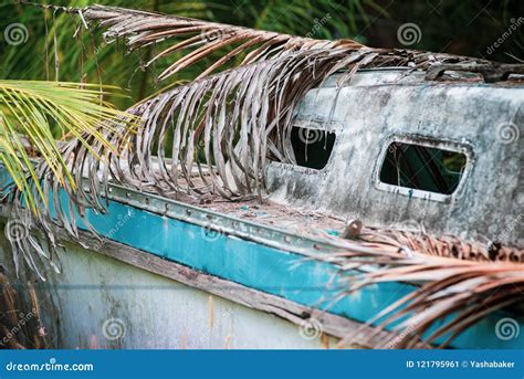 Wrecked And Weathered Hull Of An Abandoned Sailboat Royalty Free Stock