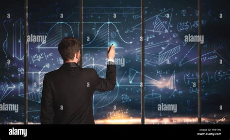 Businessman Drawing Business Graphs Stock Photo Alamy