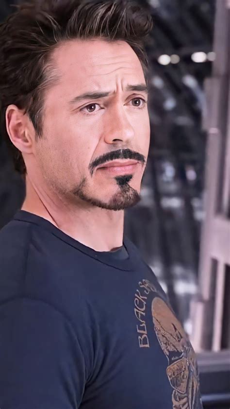 Robert Downey Jr as Tony Stark, the iconic Iron Man