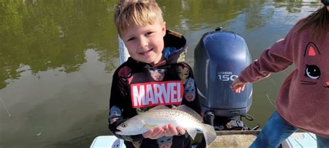 Kids have a great day catching fish! - Naples Fishing Guide