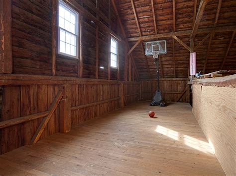 Basketball game anyone? This home features an indoor basketball court ...