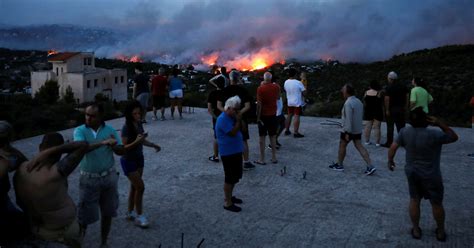 In Greece, Wildfires Kill Dozens in Deadliest Blaze in Years - The New York Times