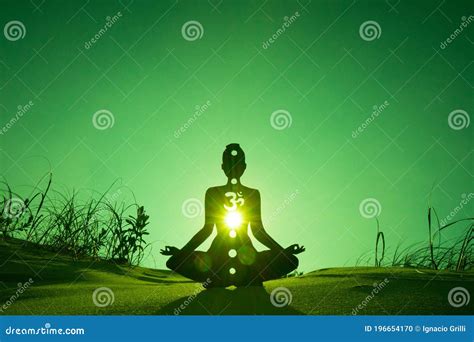 Heart Chakra Meditation In Yoga Lotus Pose In Front Of Anahata Chakra