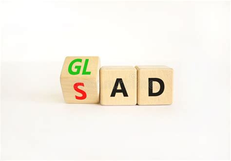 Glad Or Sad Symbol Businessman Turns Wooden Cubes And Changes The Word