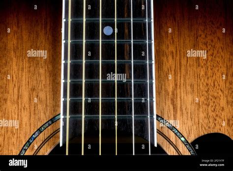 Mahogany Acoustic Guitar Closeup View Of Body And Fretboard Stock Photo