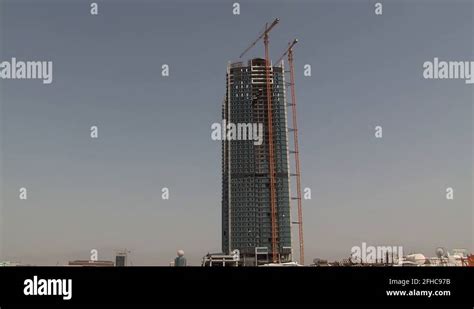 Construction of Julphar Towers in Ras Al Khaimah, UAE Stock Video Footage - Alamy