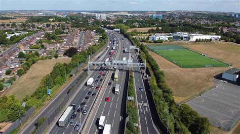 Aerial view of Busy Motorways with Traffic at England UK. 10826404 Stock Video at Vecteezy