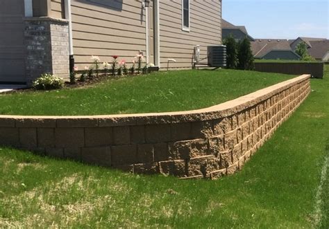 How To Build A Retaining Wall On A Steep Slope Landscaping Retaining Walls Backyard Hill