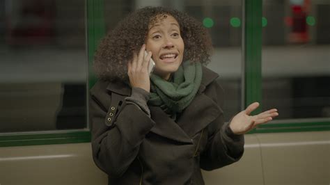 Arguing Woman Talking Angry on Mobile Phone in the City At Night