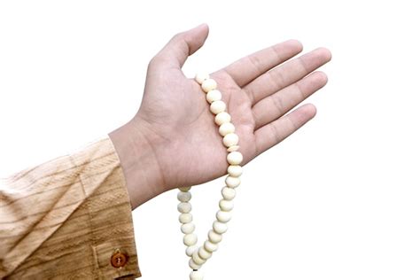 Premium Photo Muslim Man Holding Prayer Beads