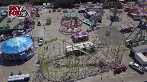 Workers prep and inspect rides at Wisconsin State Fair