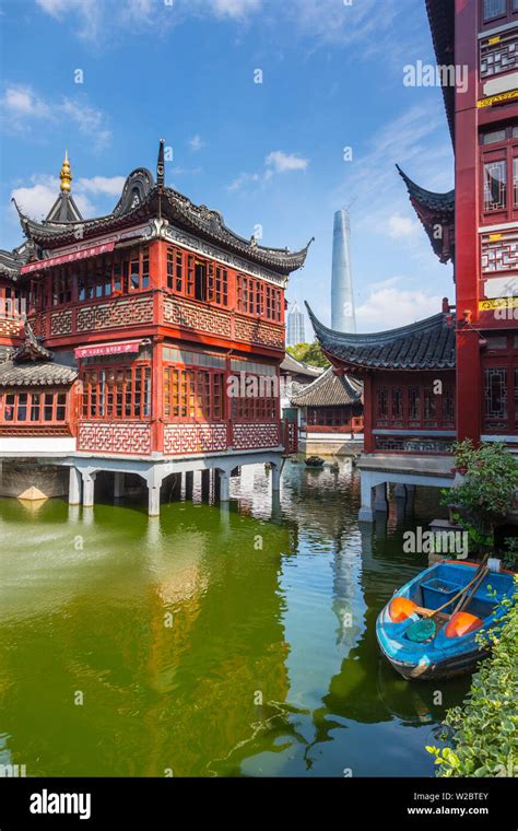 Tea House At The Yuyuan Gardens And Bazaar With The Shanghai Tower